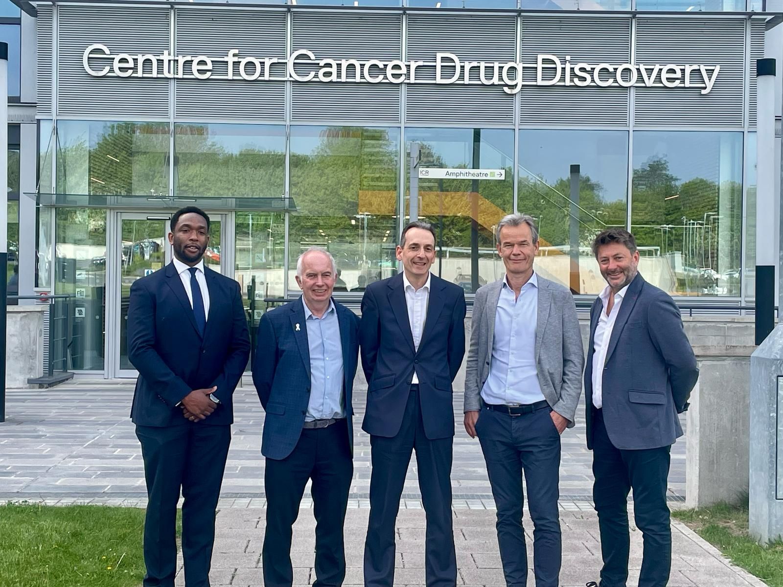 from left to right - Adedoyin Ogunbiyi (CFO, Royal Marsden); Leader of the Council, Councillor Barry Lewis; David Epstein (MD Aviva Capital Partners); Kristian Helin (ICR CEO), Barry Jessup (Managing Director Socius) all standing outside London Cancer Hub in Belmont
