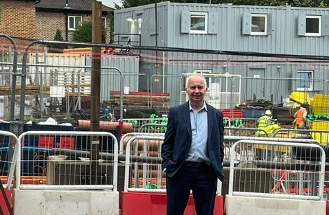 Leader of the Council, Cllr Barry Lewis outside a construction site